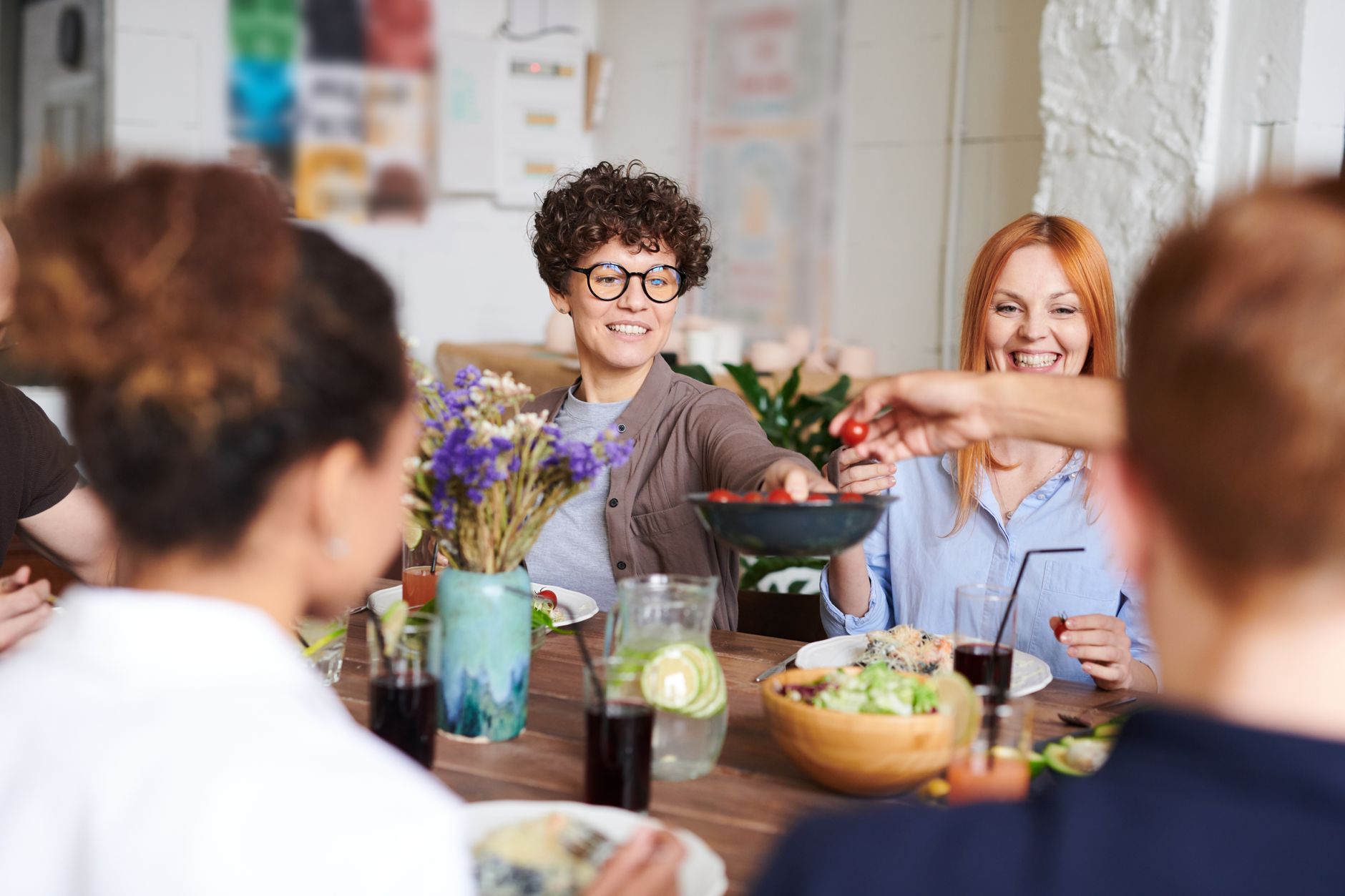 Friends sharing a relaxed meal around a table