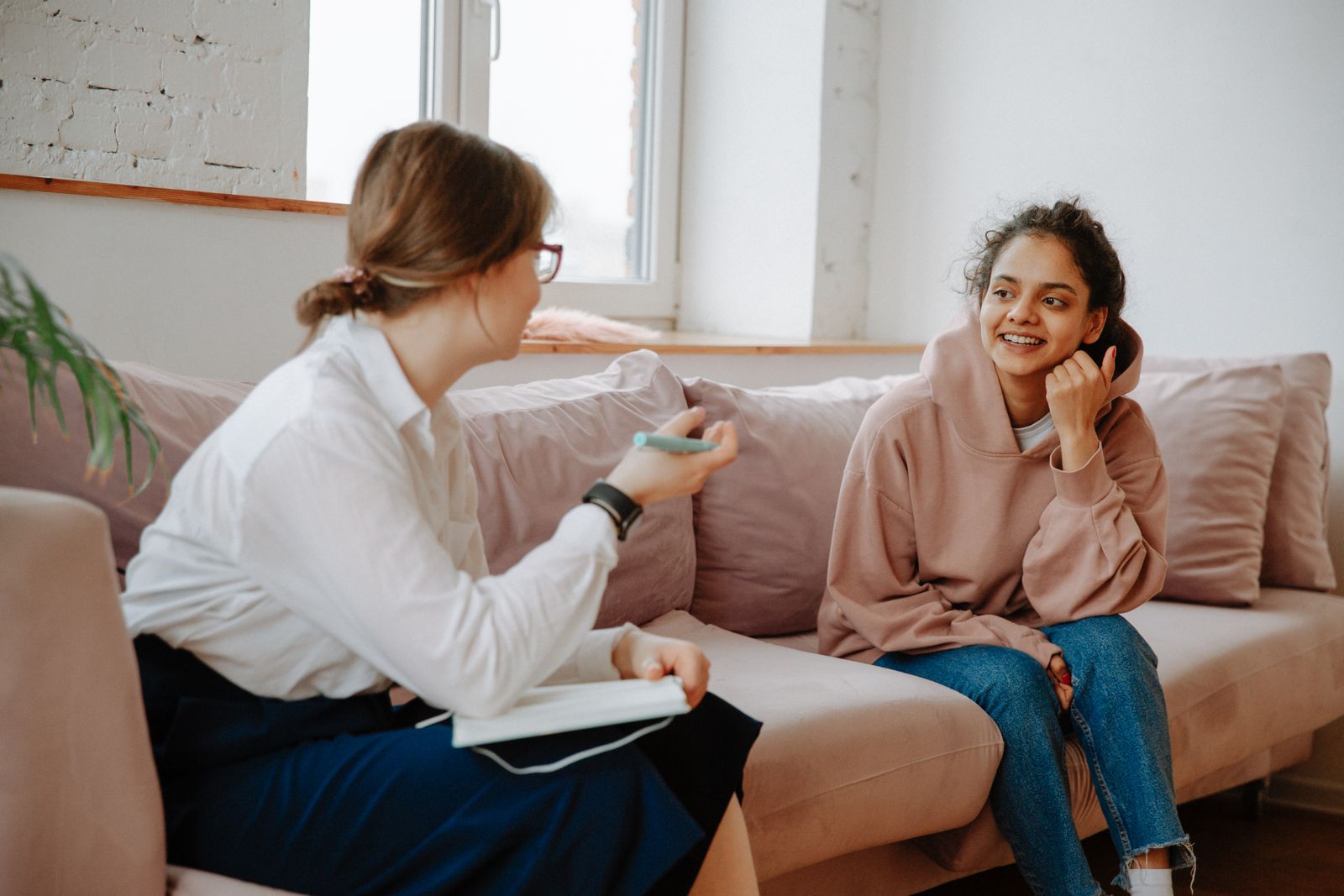 Two adults in an unhurried, warm conversation